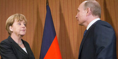 Putin trifft Schoko-König Poroschenko