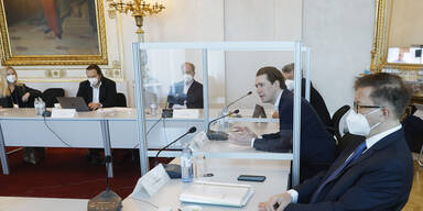 Anschober und Kurz bei Gipfel durch Scheibe getrennt