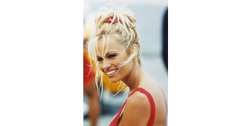 pamela-anderson-smiling-in-a-scene-from-the-film-shooting-star-1998.jpg