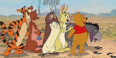 Ein kleiner B&auml;r in gro&szlig;en N&ouml;ten