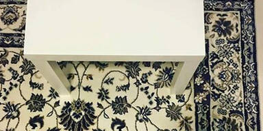 Sehen Sie das Handy auf dem Foto?