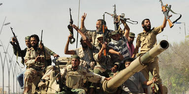 Gaddafis Leiche in Lagerhalle