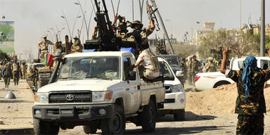 Gaddafis Leiche in Lagerhalle