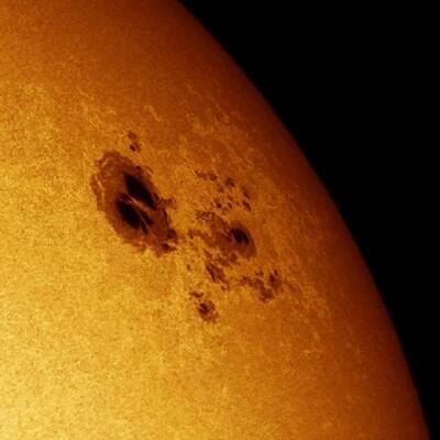 Vergleich: Sonnenfleck und Jupiter