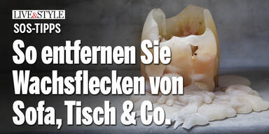 Mit Hausmitteln: So entfernen Sie Wachsflecken von Sofa, Tisch & Co.