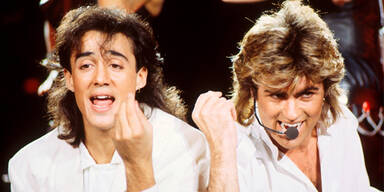 Andrew Ridgeley; George Michael "Wham!"