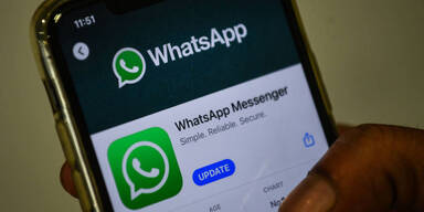 whatsapp logo appstore afp